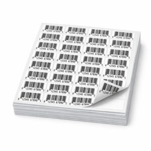 Stack of peel-and-stick label sheets printed with UPC barcodes